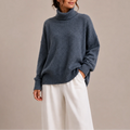 Women's Oversized Knit Turtleneck Sweater with Ribbed Cuffs